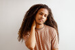 © PICHA - Portrait of a man with long curly hair