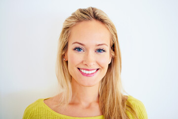 Wall Mural - Her beauty is perfect. Studio shot of a happy young woman.