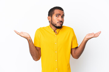 Wall Mural - Young Ecuadorian man isolated on white background making doubts gesture