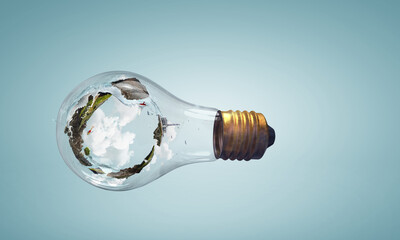 Wall Mural - Green landscape inside light bulb