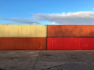 Generic shipping containers on a dock with copy space 