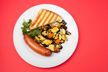 Poster - fried sausage with vegetables and toast on plate