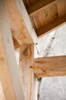 Traditional joinery in wooden architecture -  skilled carpenter work -  connected beam and post in the barn style building.