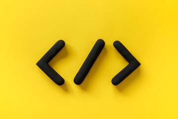 Coding language development icon on yellow background. Software development concept. Programming code browser symbol, 3d sign website coding.