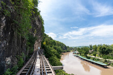 The Railway At The Foot Of The Mountain, Next To The River And Blue Sky : Tham Krasae, Kanchanaburi Province Landmark Of Thailand Location