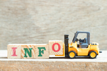 Poster - Toy forklift hold letter block o to complete word info on wood background