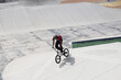 © Adriano - Boy man doing extreme sport doing tricks on bike bmx track