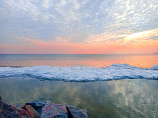 Wall Mural - Sunset sky over sea in the evening with colorful clouds