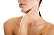 © T Hover/peopleimages.com - Soft to the touch. Cropped image of a young woman with her hand on her neck.