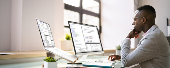 african american programmer man coding