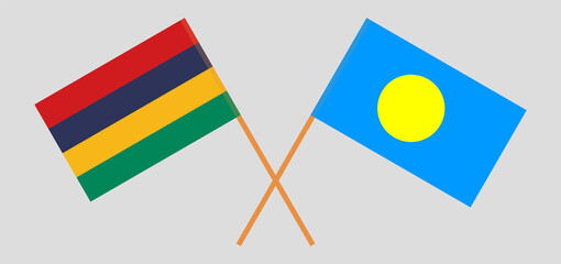 Crossed flags of Mauritius and Palau. Official colors. Correct proportion