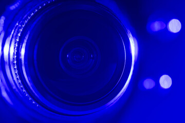 Wall Mural - Camera lens with blue backlight. Optics