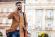 © ivanko80 - Attractive businessman using smart phone