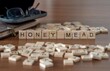 honey mead word or concept represented by wooden letter tiles on a wooden table with glasses and a book