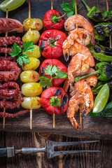 Wall Mural - Healthy grilled skewer made of colorful and summer ingredients.