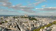 Establishing aerial view of Paris Sacre-Coeur and Montmartre hill on a beautiful day, Paris France gothic architecture 