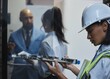© Siphosethu F/peopleimages.com - The wonder of getting up close and personal. Shot of a young woman closely inspecting a motherboard in a server room.