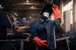 © Parilov - Worker girl with welding on steel structure in factory, light spark