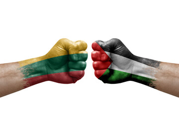 Two hands punch to each others on white background. Country flags painted fists, conflict crisis concept between lithuania and palestine