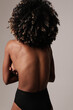 © face_reader_img - Vertical portrait of young woman with perfect body and natural hair. Isolated.