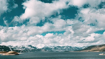 Wall Mural - Oppland, Tyin Lake, Norway. Stones On Coast Of Beautiful Lake Tyin In Summer Day. Norwegian Nature. 4K.