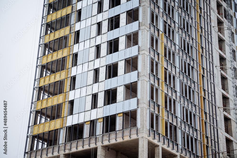 Aluminum Window Cladding High Rise The facade of the house outside is insulated with mineral wool. Put ...