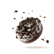 White Chocolate Glazed Donut With Dark Cookies Crumbs And Creme Filled Flying Isolated