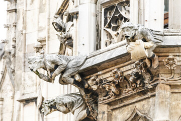 Wall Mural - Gargoyle sculptures on gothic European building