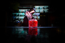 Woman Hand Bartender Making Negroni Cocktail In Bar