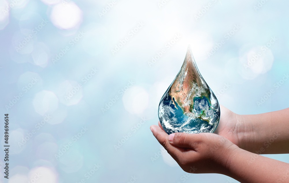 World water day. A globe in the shape of a drop of water falling onto ...