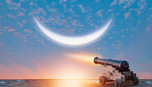 Ramadan Kareem Concept - Ramadan Kareem Cannon With Crescent Moon At Amazing Sunset