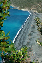 Black Sand Beach Of Nonza, View From The Genoese Tower, Cap Corse In Corsica, France
