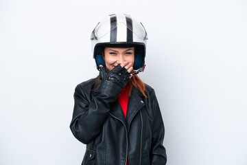 Wall Mural - Young Russian girl with a motorcycle helmet isolated on white background happy and smiling covering mouth with hand