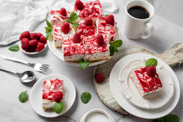 Wall Mural - Raspberry bar cheesecake with whipped topping and fresh raspberries. tasty dessert. 