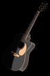 © Vasyl Onyskiv - Close-up of acoustic guitar isolated on black background.