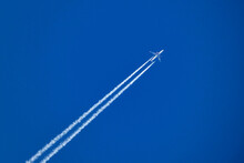 Airplane In The Blue Sky