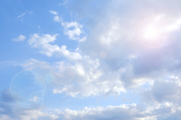 Wall Mural - sky.heaven background. clouds background.white clouds and sun rays in a blue sky. the sky is in very