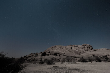 Night shot of the Namibian Desert near Spitzkoppe, under a clear starry southern sky.