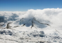 Mount Hermon In The Golan Heights Covered With Snow And Clouds