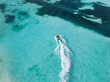 © Westend61 - Man driving personal watercraft in sea on vacations