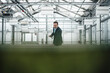 © Westend61 - Businessman holding tablet PC analyzing machinery in greenhouse