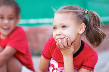 What will I be one day - Dreams and Aspirations. Cute little preschoolers sitting together outdoors.