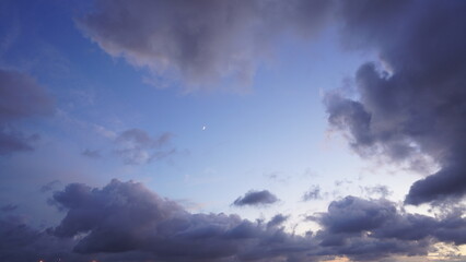 Wall Mural - the beautiful sunset view with the colorful clouds and sky in the city
