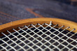Vintage wooden tennis racquet and strings.