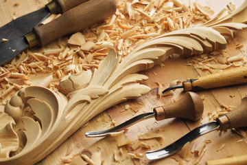 Sticker - Woodworking tools. Carving wood with chisel. Carpenter's hands use chiesel