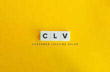 Customer Lifetime Value (CLV) Banner. Letter Tiles On Yellow Background. Minimal Aesthetics.