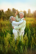© aletia2011 - happy senior couple dancing in summer park