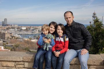 Sticker - Cute little children tourists admiring Barcelona city, family travel with kids