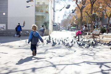 Sticker - Cute little children tourists admiring Barcelona city, family travel with kids