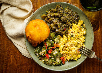 Wall Mural - Jamaican breakfast with ackee, callaloo, okra and fritters